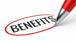 Closeup of the tip of a red pen circling black text, reading "BENEFITS"