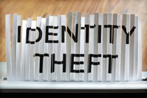 Identity theft concept, shredding personal information